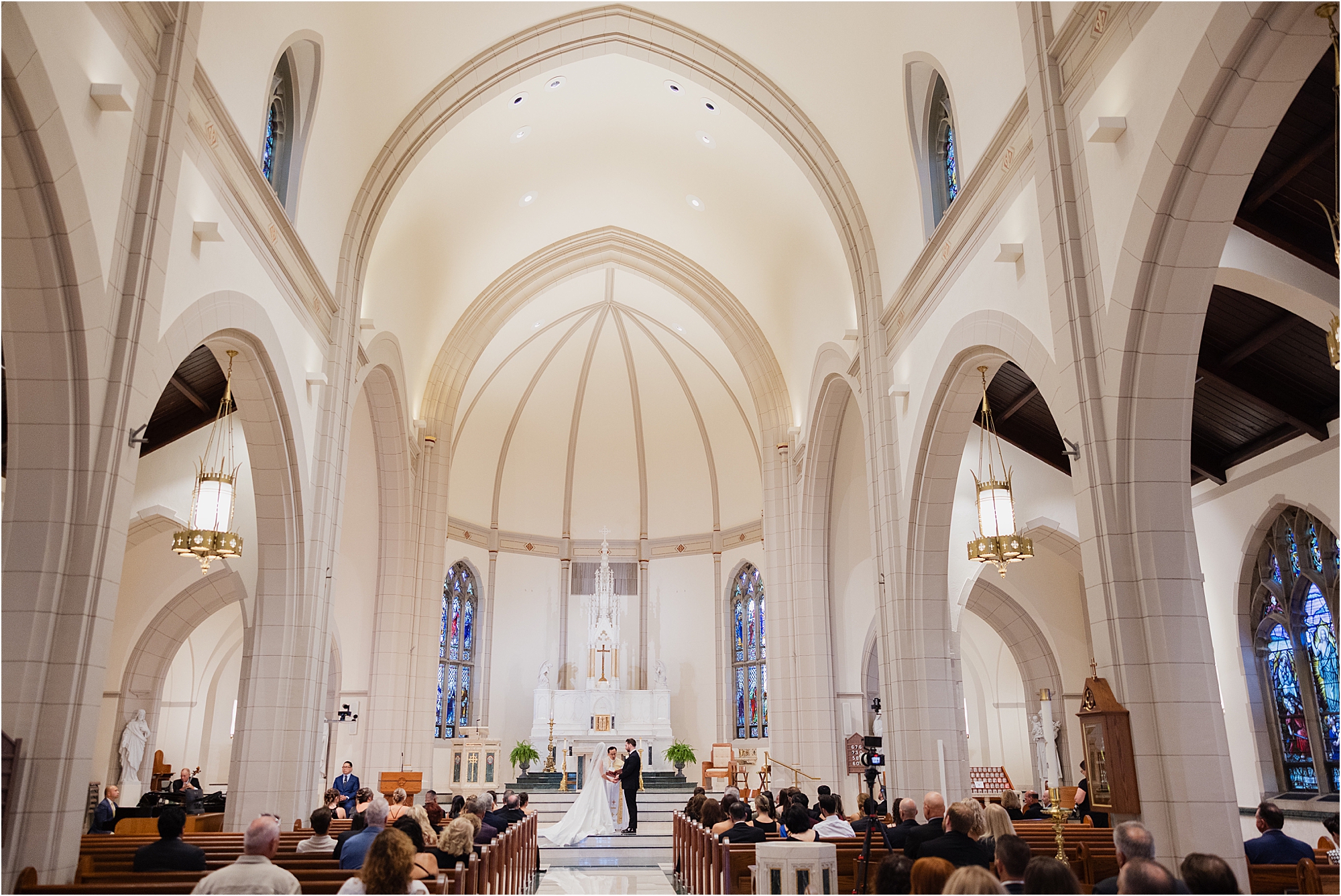 bride and groom ceremony at St. Teresa of Avila Church