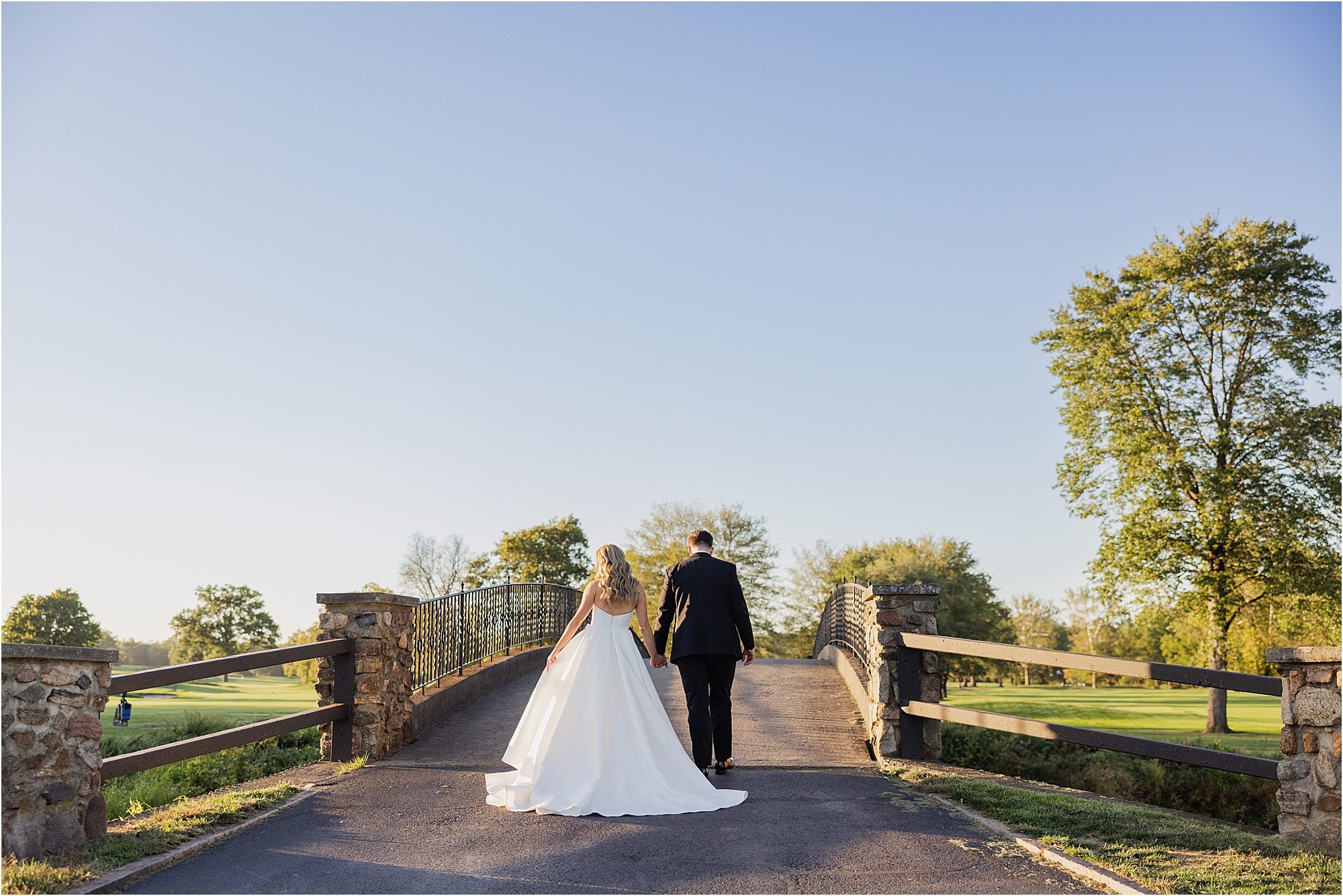 bride and groom portrait at Fiddler’s Elbow Country Club during golden hour