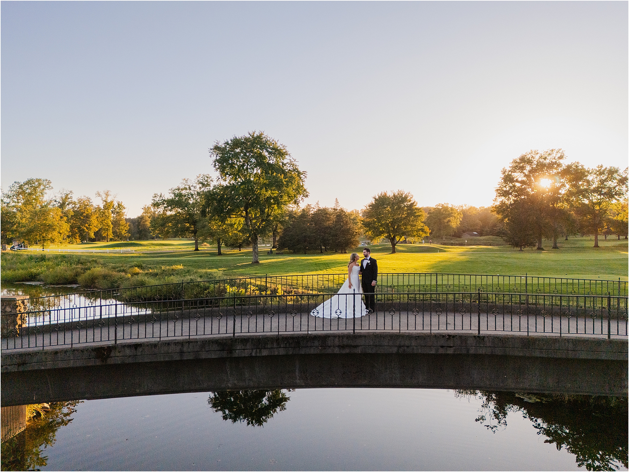 bride and groom portrait at Fiddler’s Elbow Country Club during golden hour