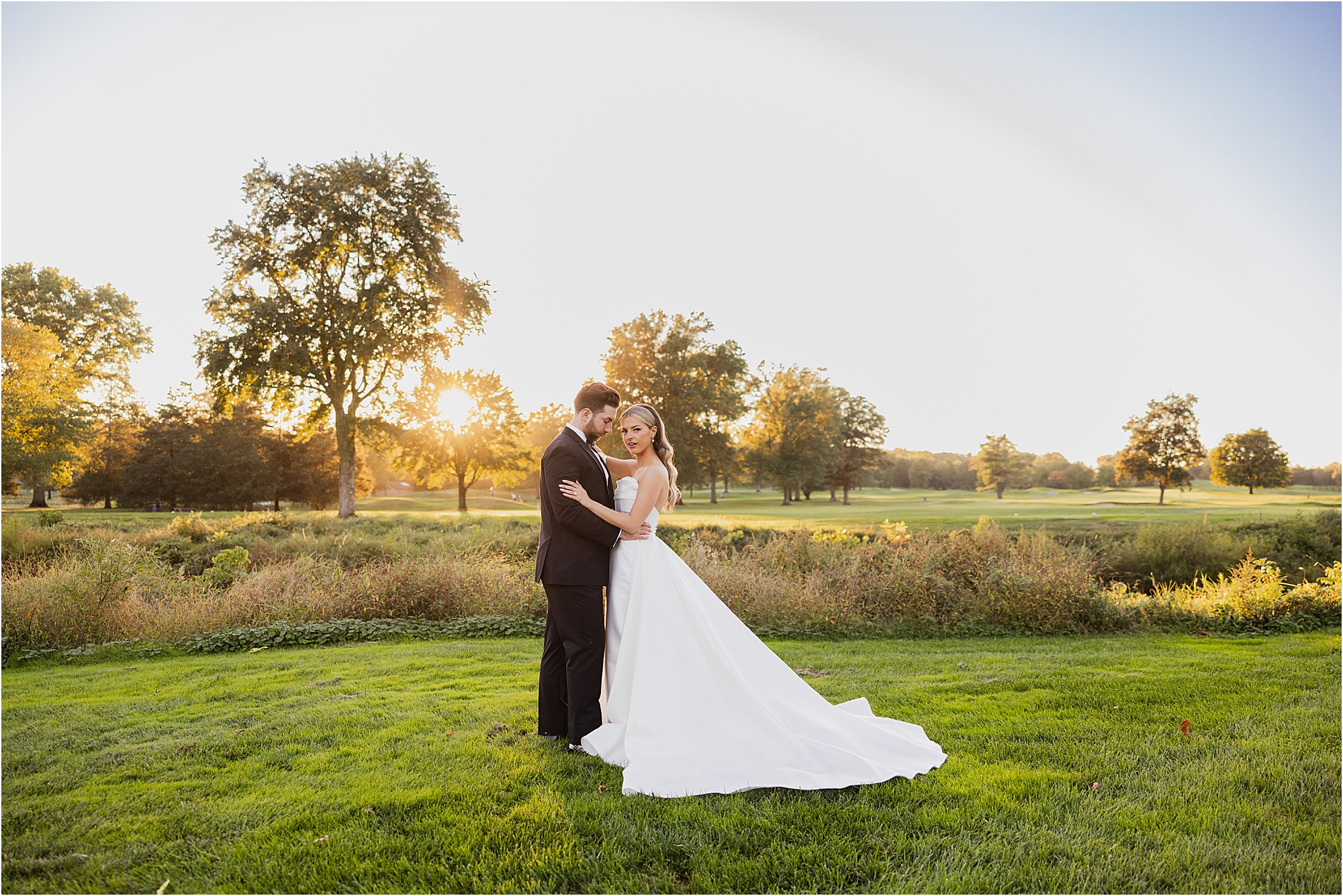 bride and groom portrait at Fiddler’s Elbow Country Club during golden hour